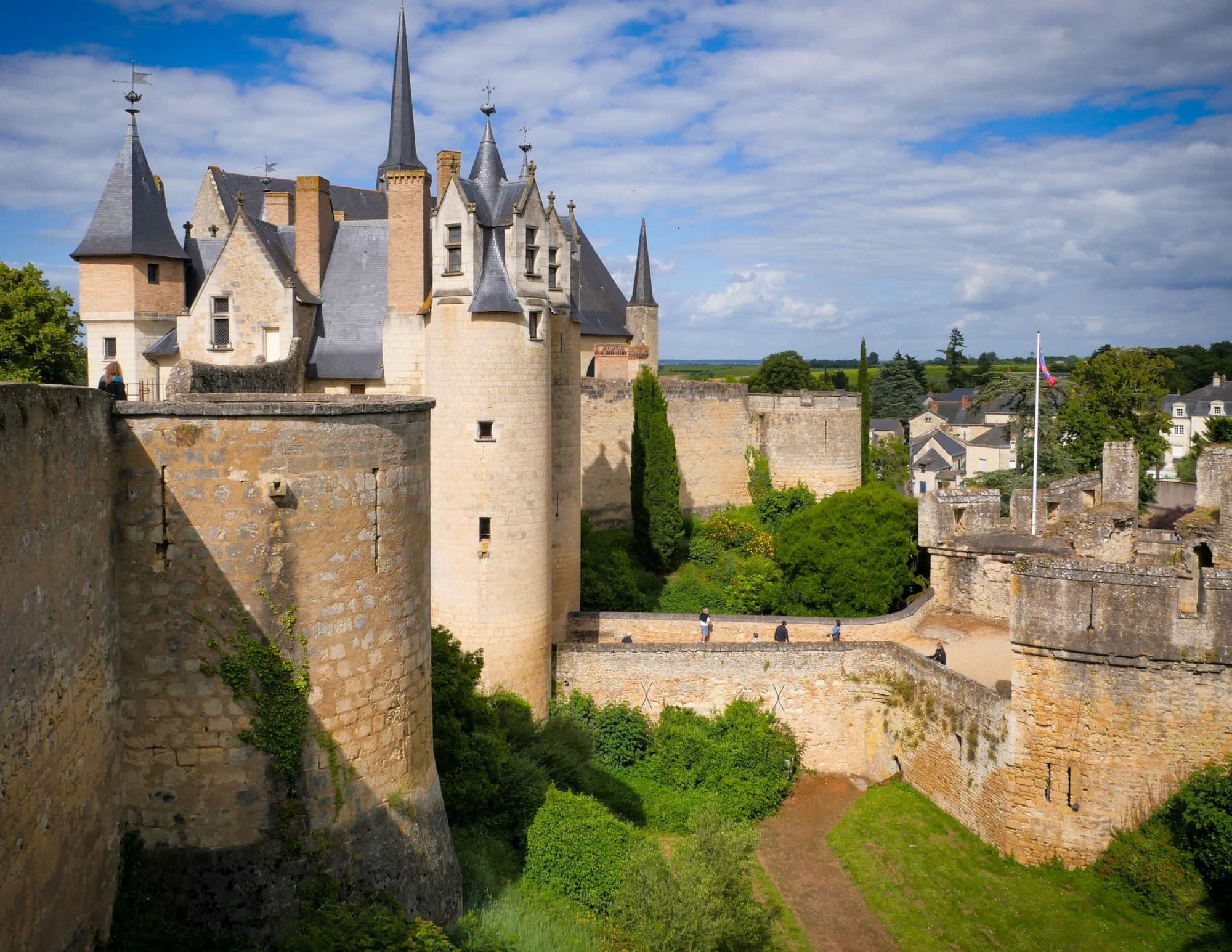 Majestic Château de Montreuil-Bellay in France's scenic Loire Valley.