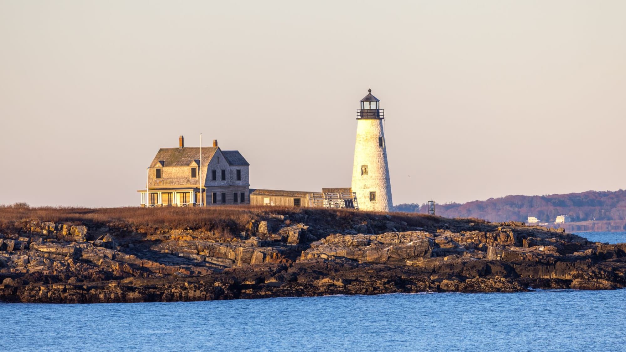 Scenic view of Wood Island Lighthouse during sunset in Biddeford, Maine.