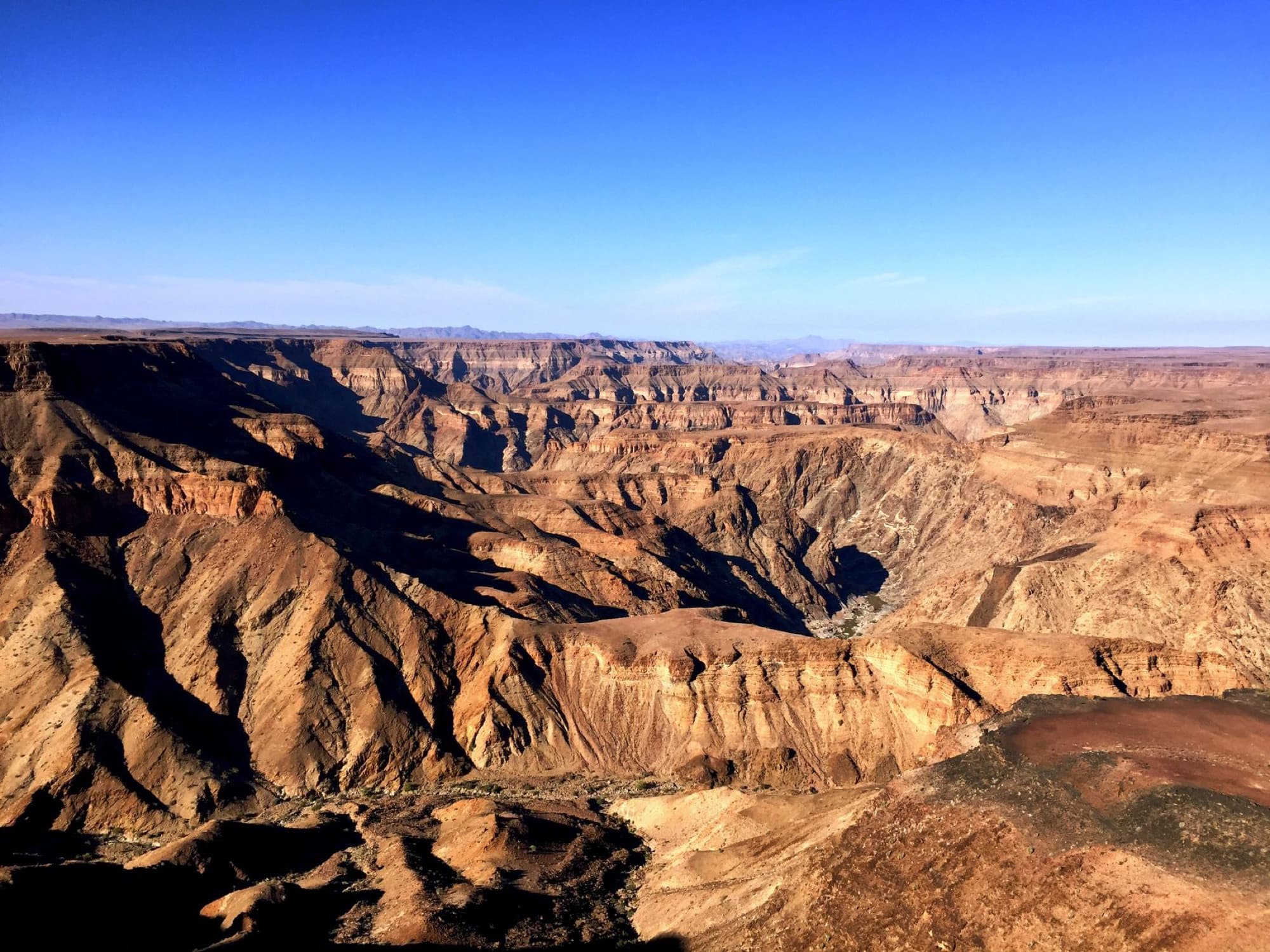 A breathtaking view of Fish River Canyon's vast and rugged landscape in Namibia.