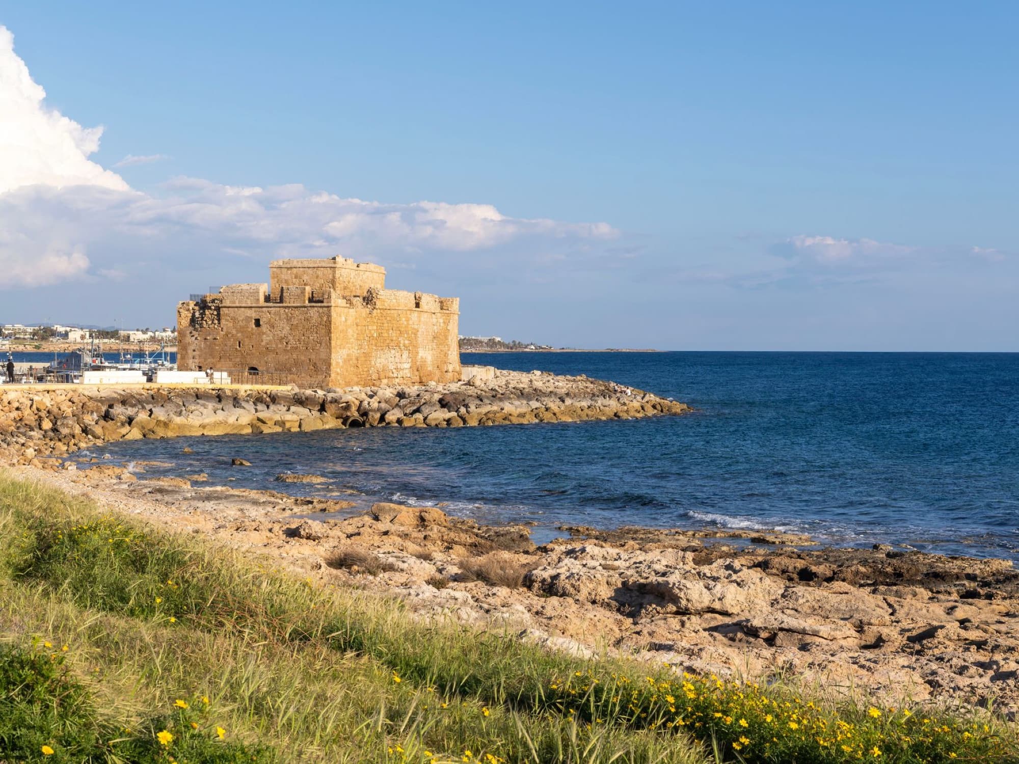 Scenic view of the historic Paphos Castle on the Cyprus seafront.