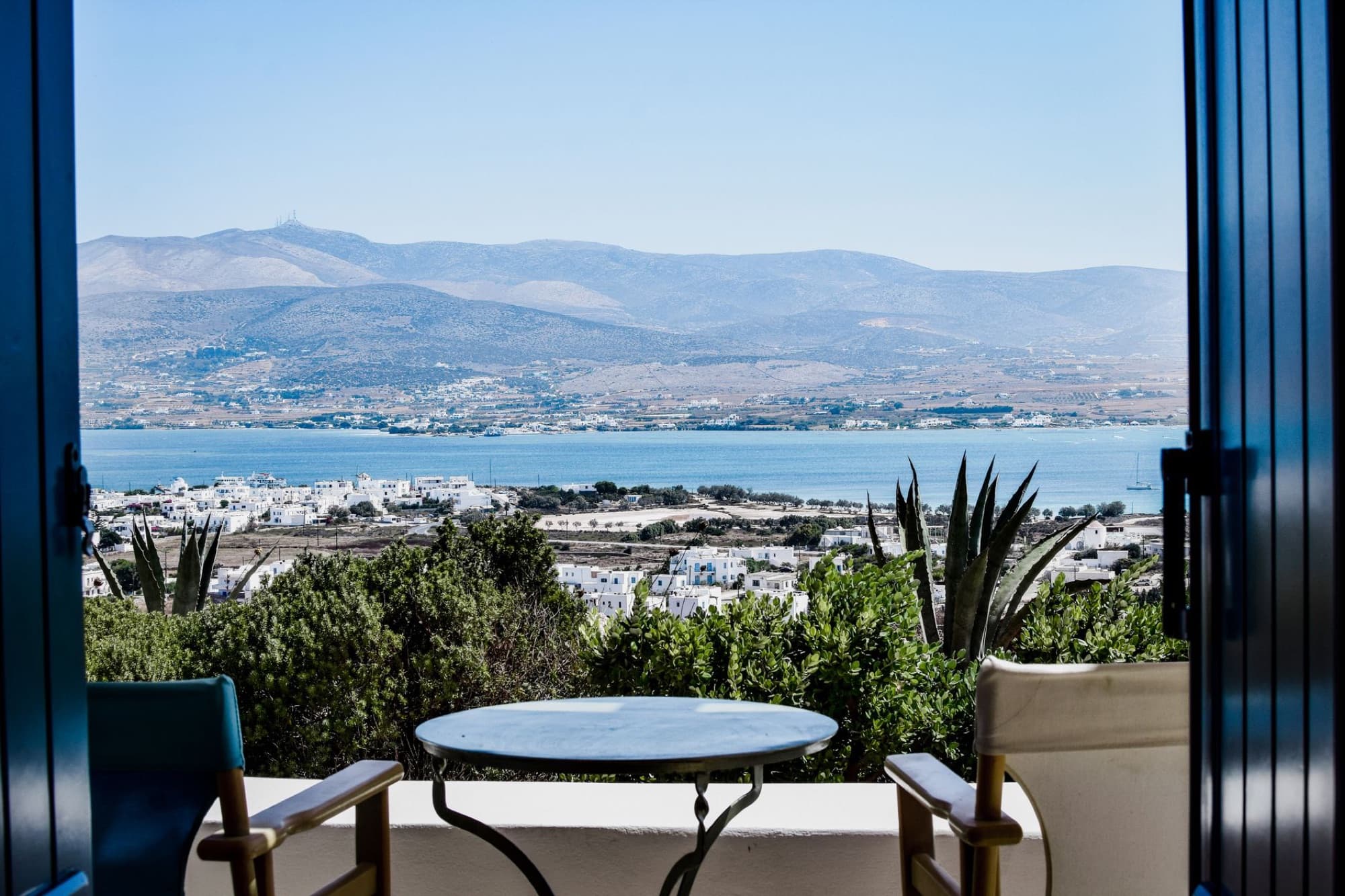 Relaxing view of Antiparos, Greece from a luxurious balcony setting.