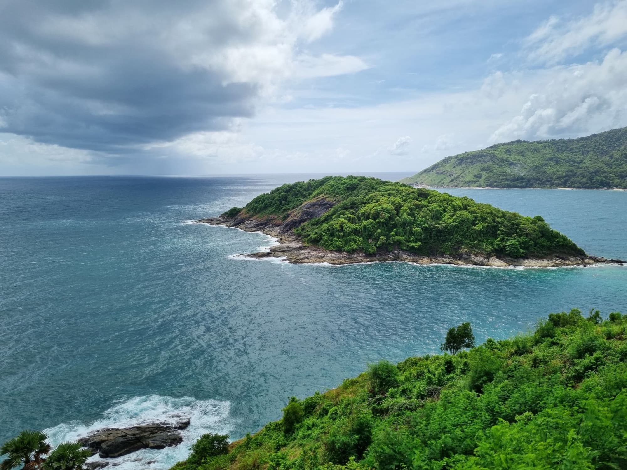 Beautiful aerial view of an island with lush greenery in Phuket, Thailand.