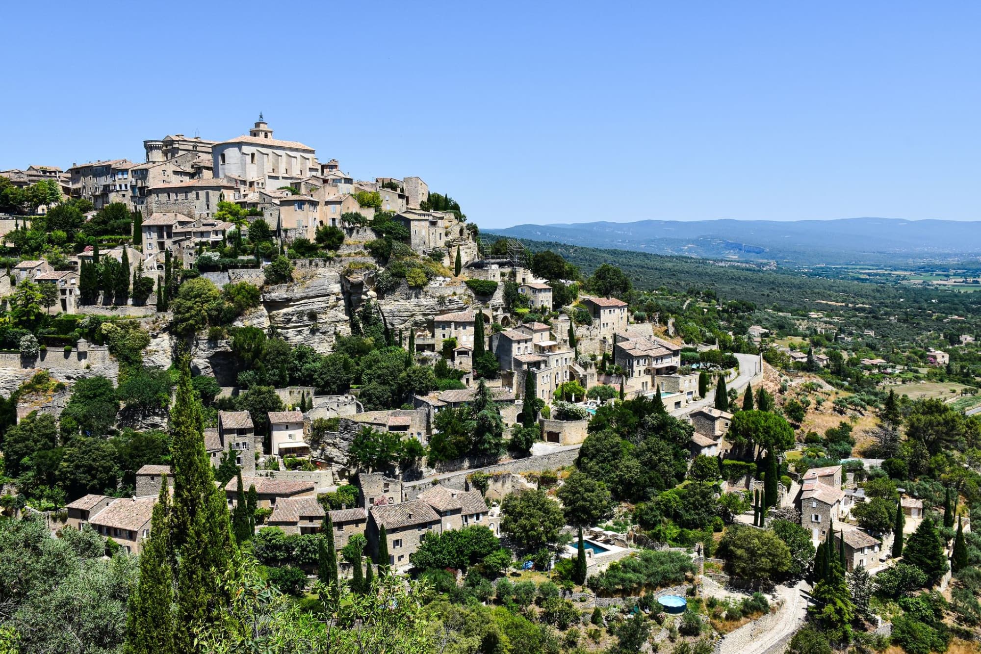 Captivating aerial view of Gordes, a historic hilltop village in Provence, France.