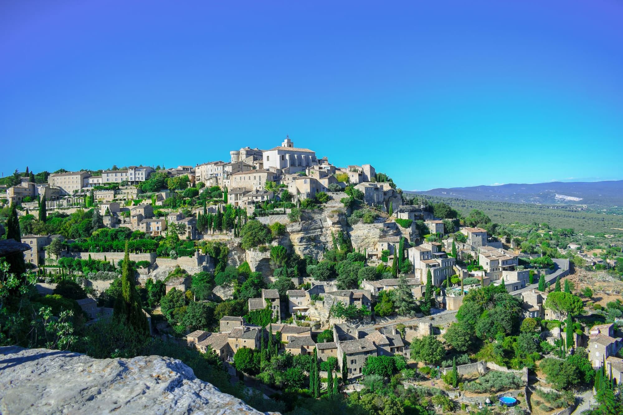 Breathtaking summer landscape of Gordes, a picturesque hilltop town in Provence, France.