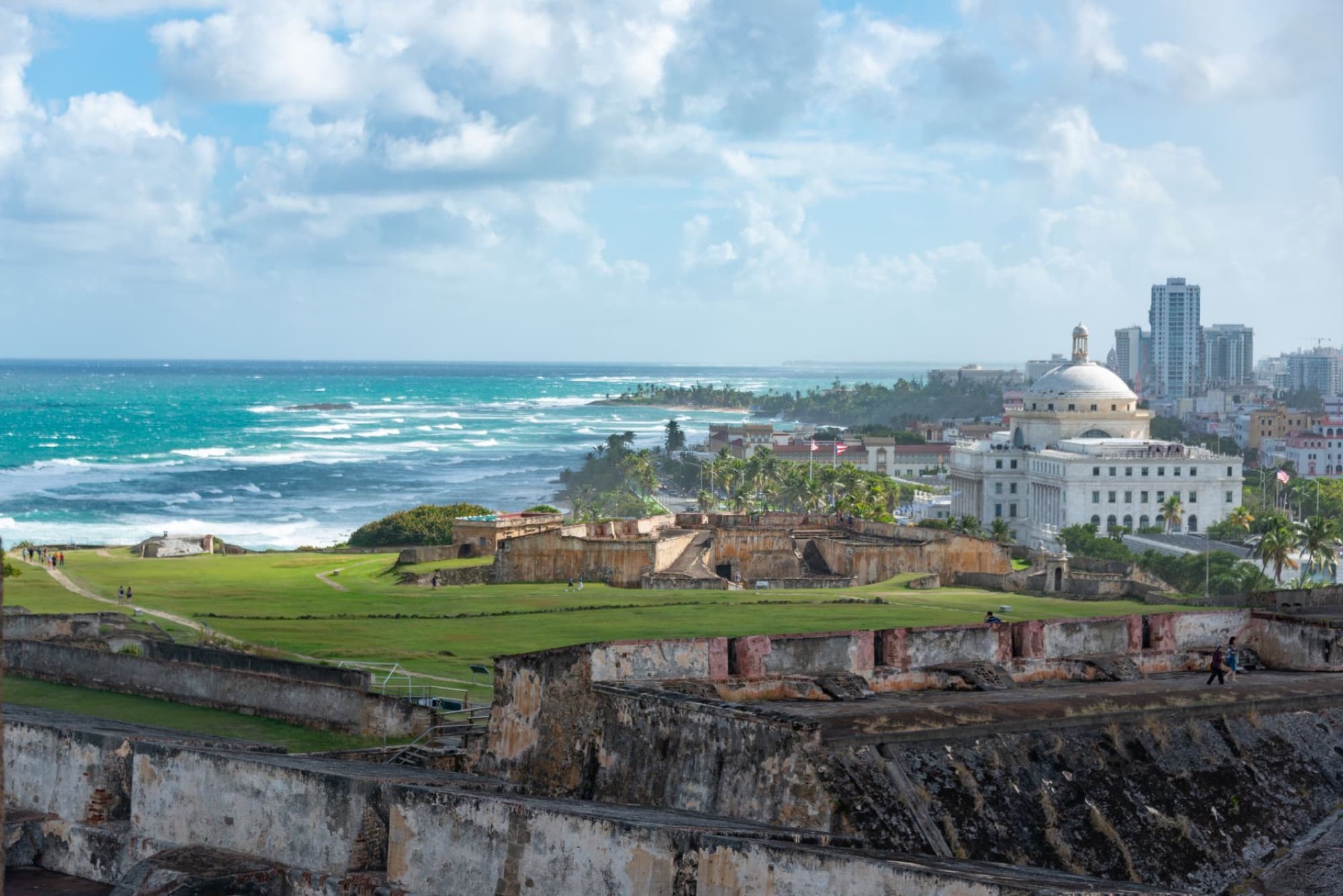 Explore the beautiful coastline and historic El Morro fortress in Old San Juan, Puerto Rico, with city and ocean views.