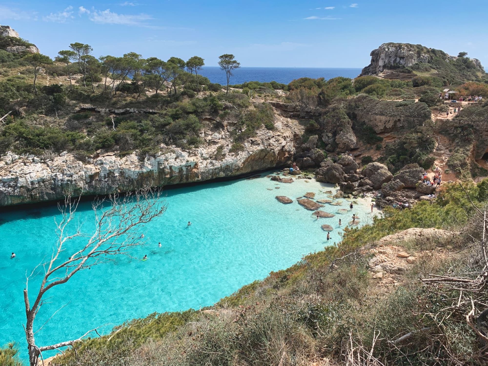 Discover the stunning azure waters and rocky coastline of Sant Antoni de Portmany, Ibiza.