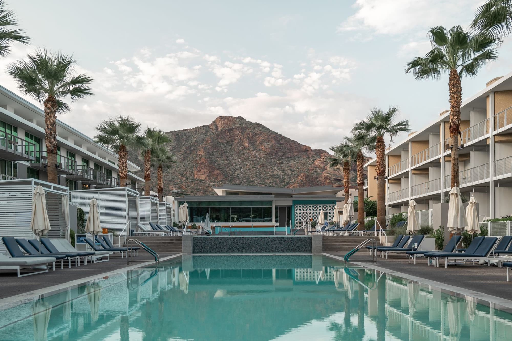Elegant resort poolside view in Scottsdale, AZ, emphasizing relaxation and luxury.