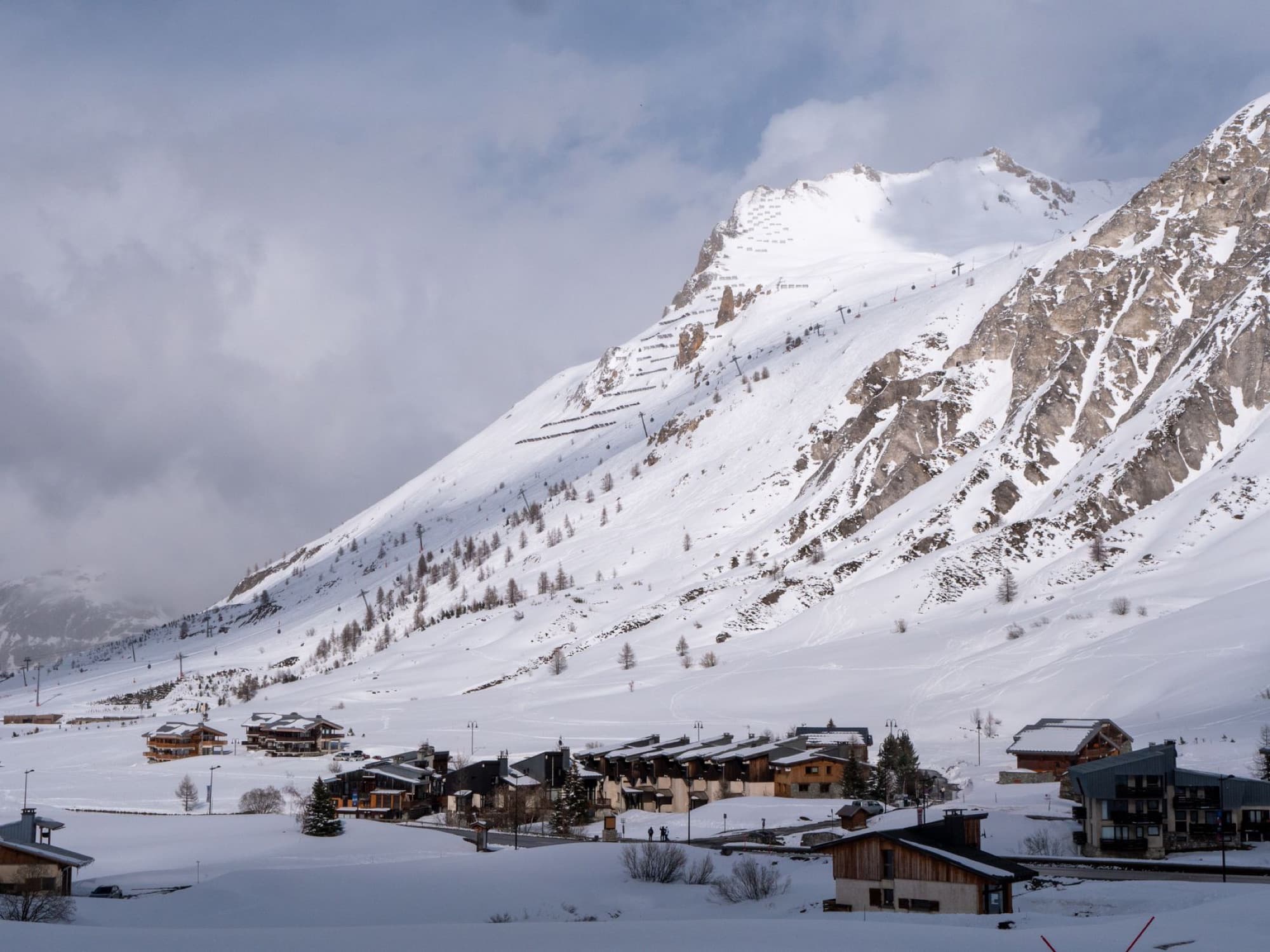 Picturesque snowy village nestled in French Alps, Tignes in winter.