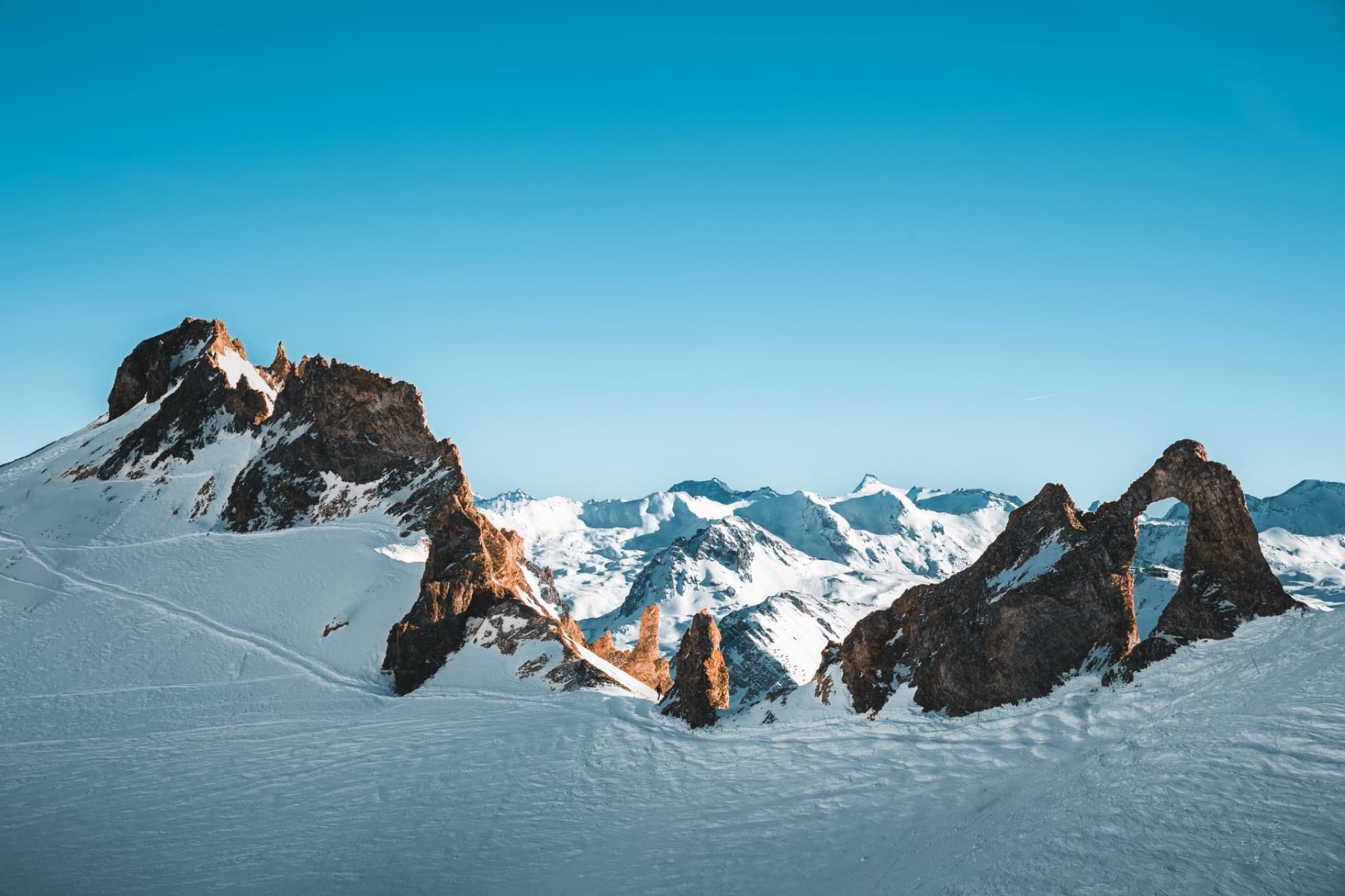 Explore the breathtaking snow-covered mountains of Val-d'Isère, France.