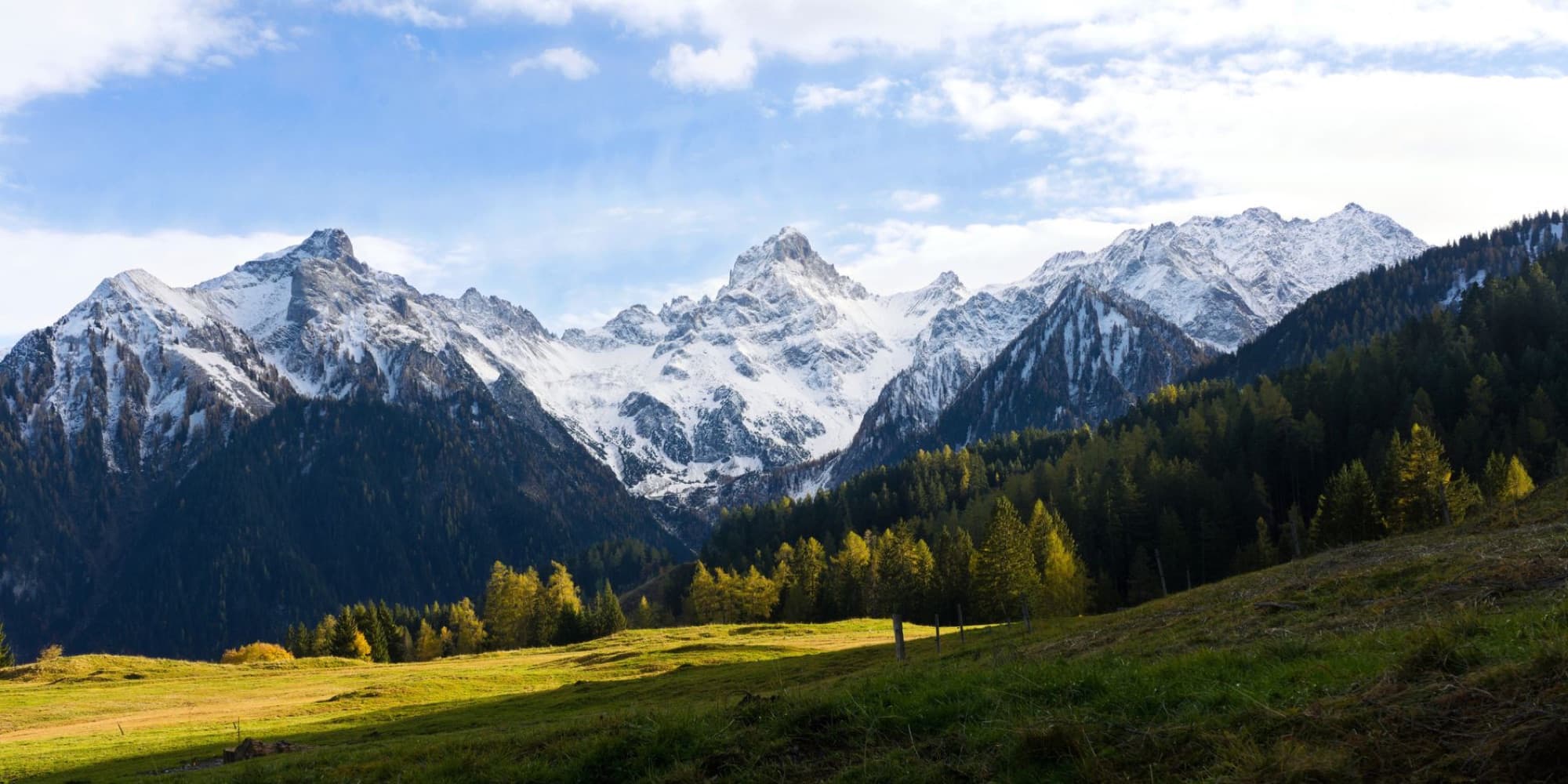 Explore the snow-capped peaks of Vorarlberg's breathtaking alpine landscape.