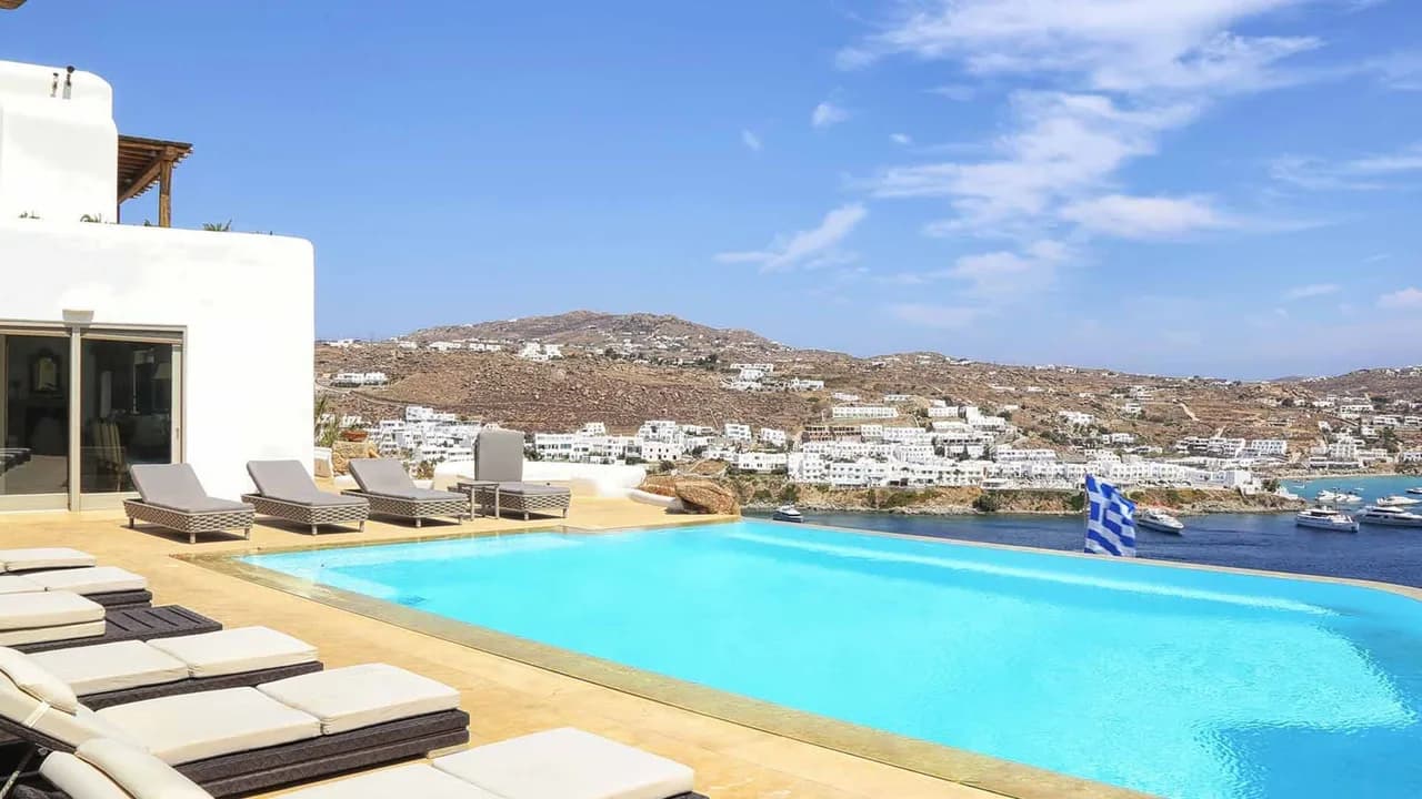 Premium Location Luxury Villa Right Above The Famous Psarou Beach